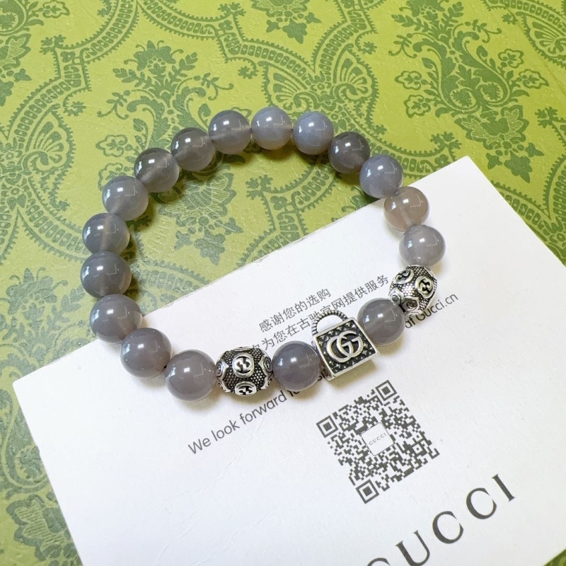 G*u*i bracelets